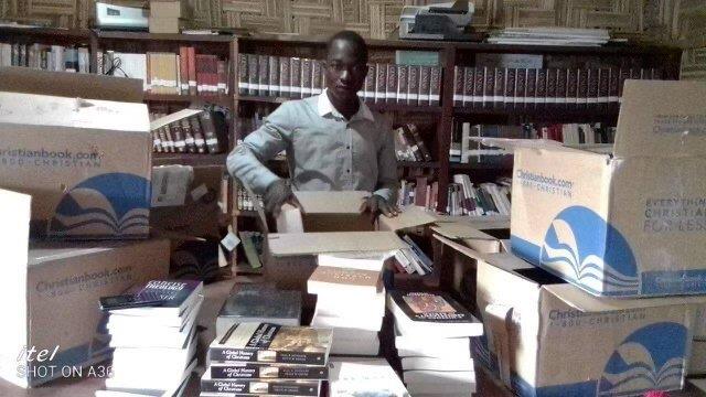 Textbooks arriving at a seminary in Liberia